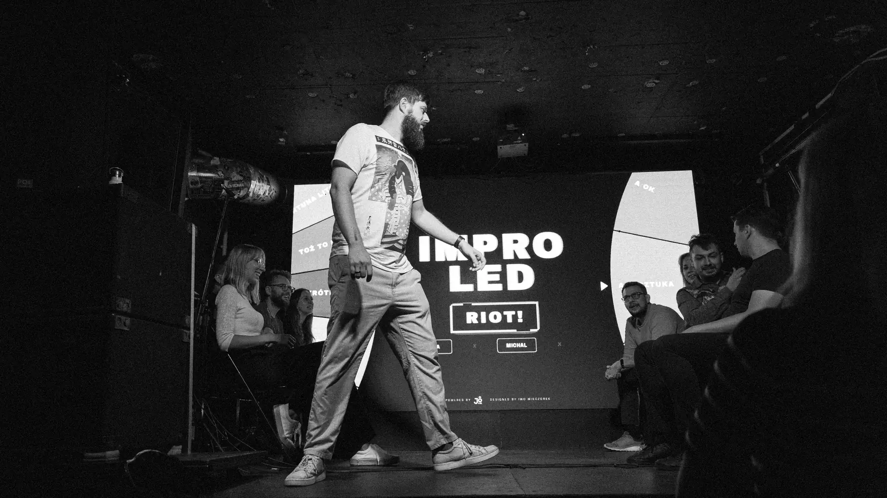 Iwo Wieczorek crossing the stage after a show